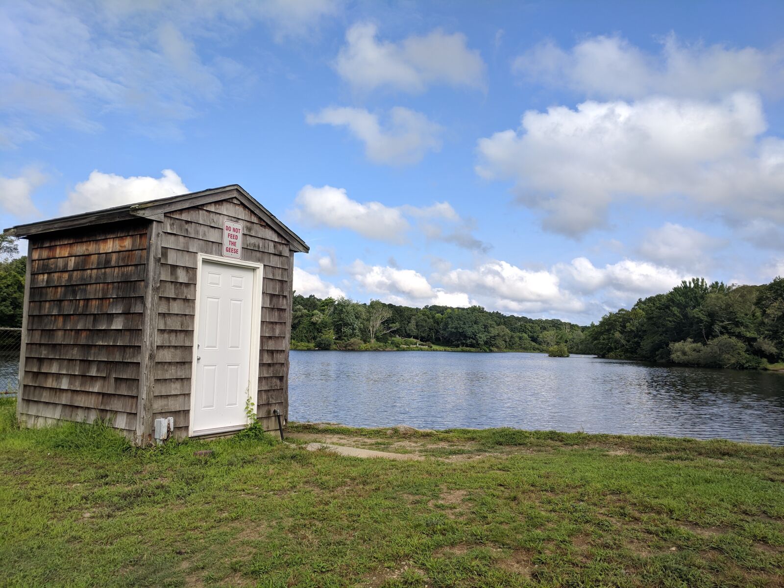 Google Pixel sample photo. Outhouse, pond, colorado photography