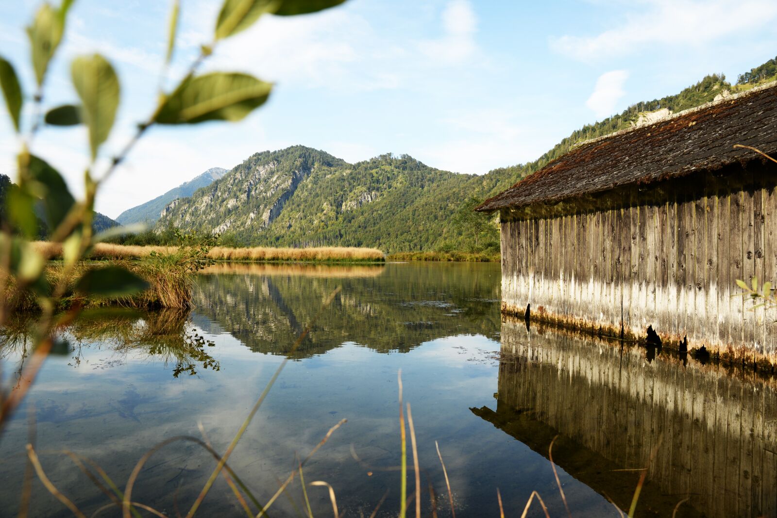 Nikon D610 sample photo. Lake, mountain, boathouse photography