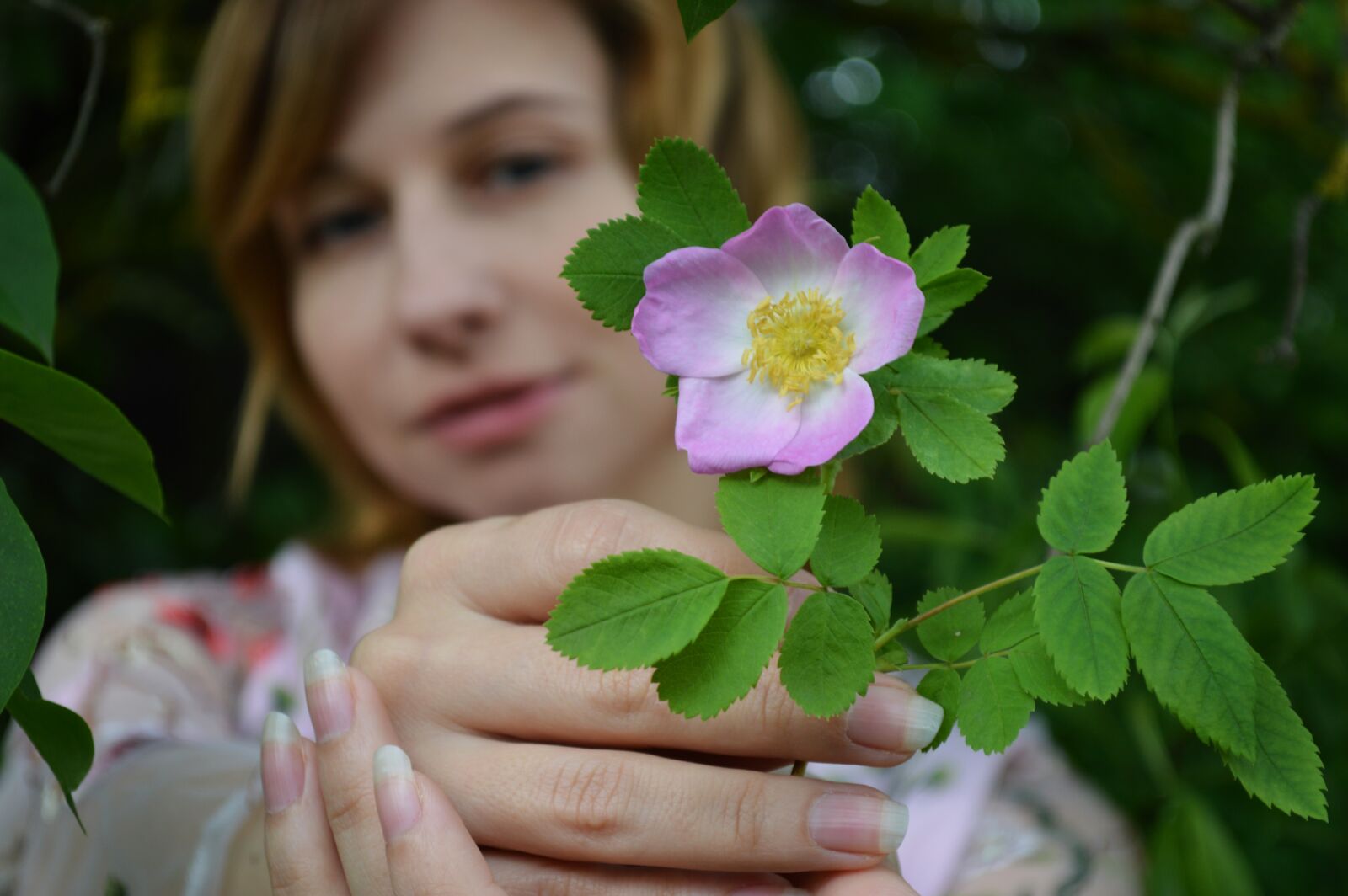 Nikon D3200 sample photo. Flower, hands, stretching photography