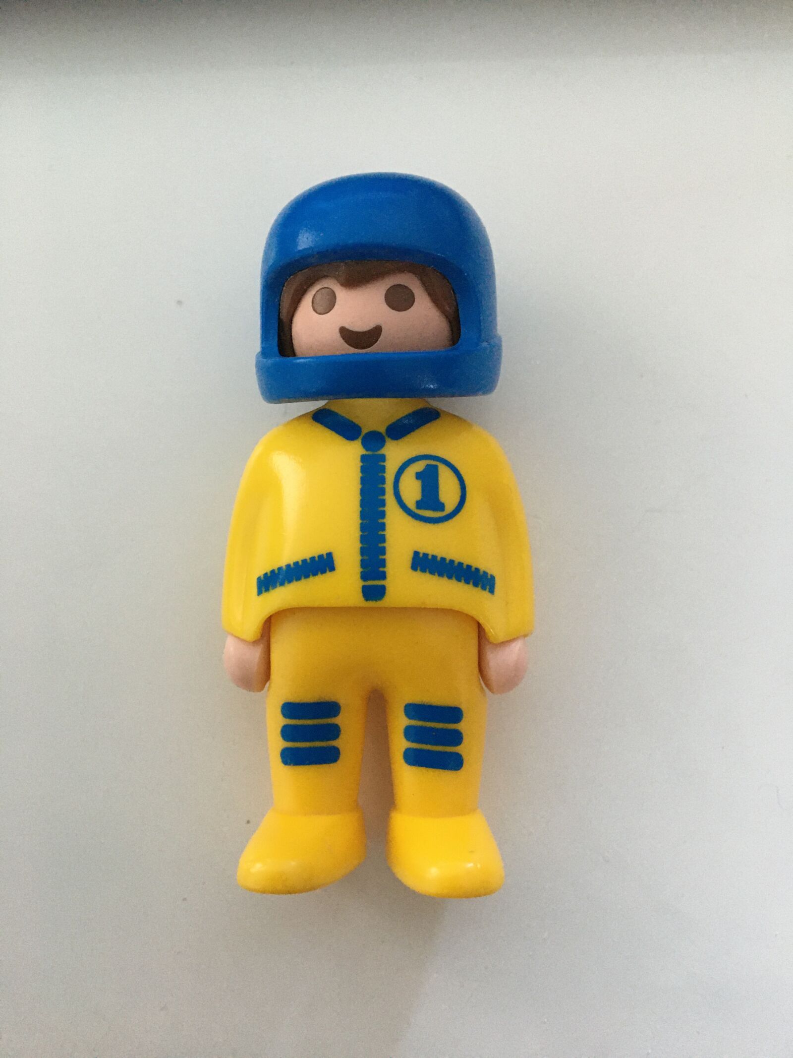 Apple iPhone 6s sample photo. Playmobil, pilot, yellow photography
