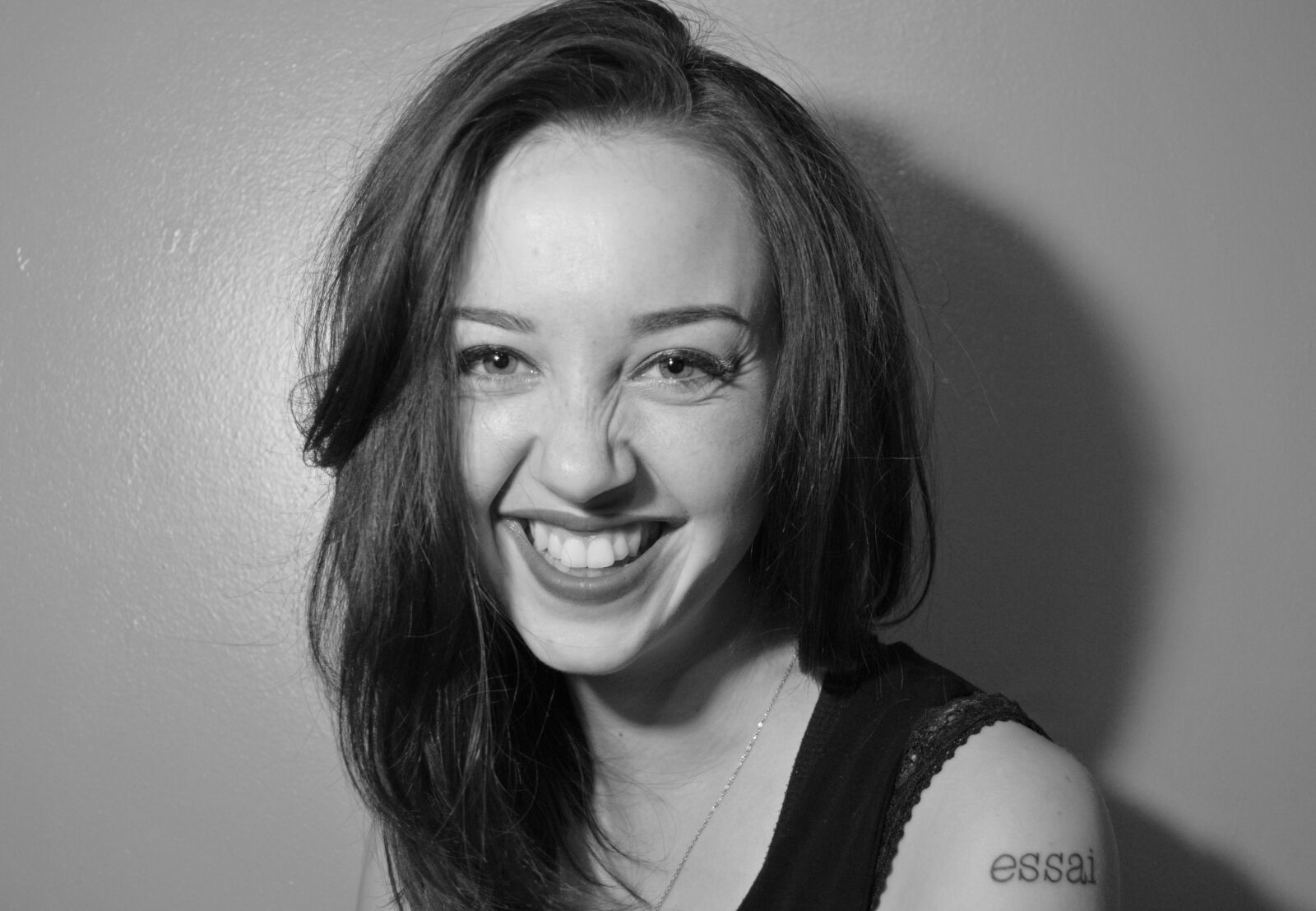 Nikon D3200 sample photo. Smile, hair, tattoo photography