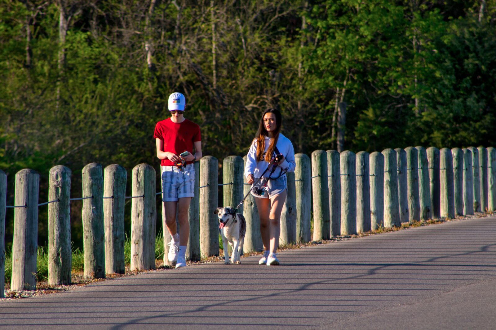 Canon EF75-300mm f/4-5.6 sample photo. Couple, walking, dog photography
