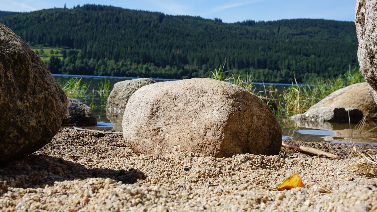 Sony E 16-50mm F3.5-5.6 PZ OSS sample photo. Schluchsee, stones, water photography