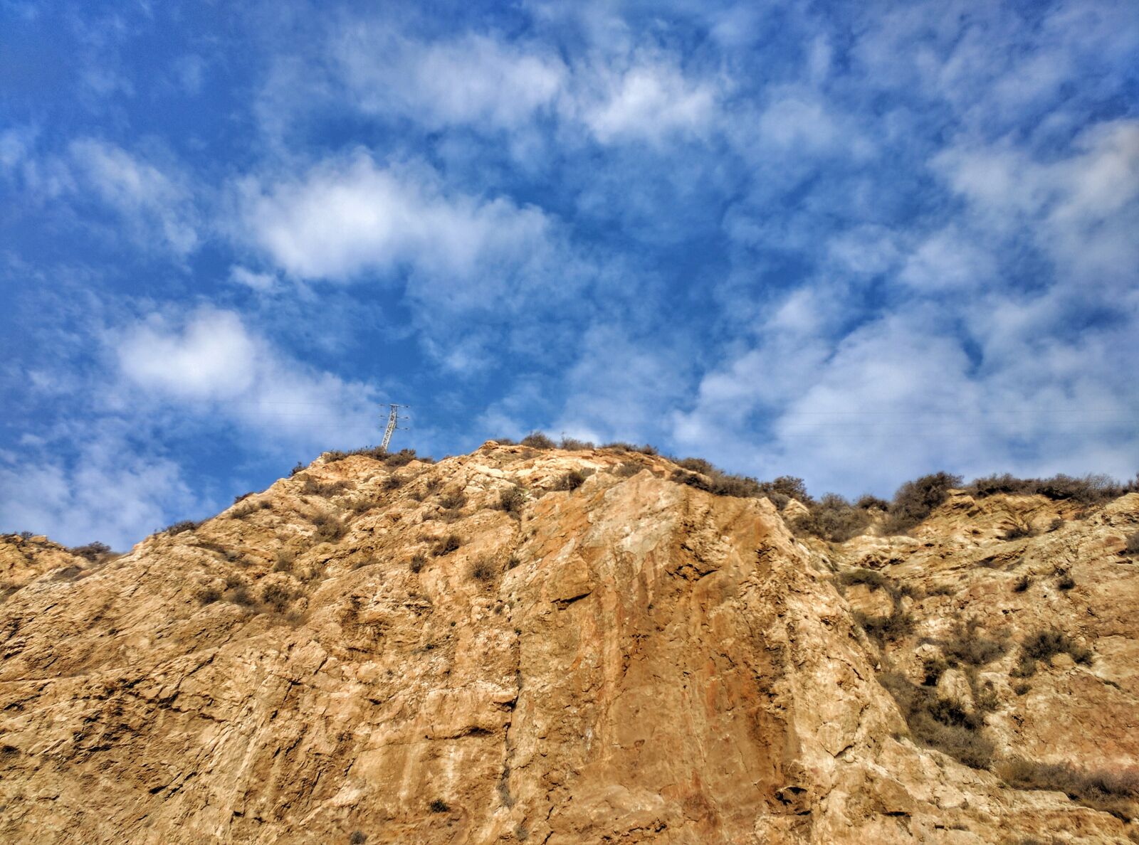 Motorola Nexus 6 sample photo. Cliff, sky, pylon photography