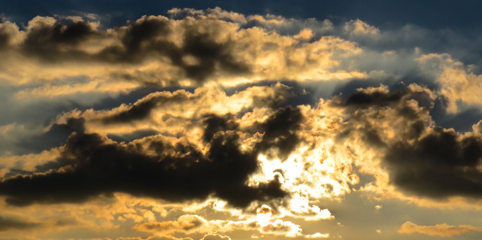 Canon PowerShot SX710 HS sample photo. Sunset, evening sun, cloud photography