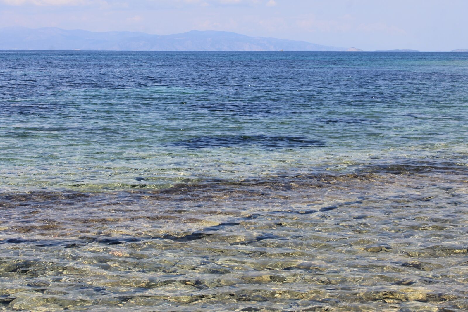 Canon EOS 1100D (EOS Rebel T3 / EOS Kiss X50) sample photo. Sea, pebbles, sand photography