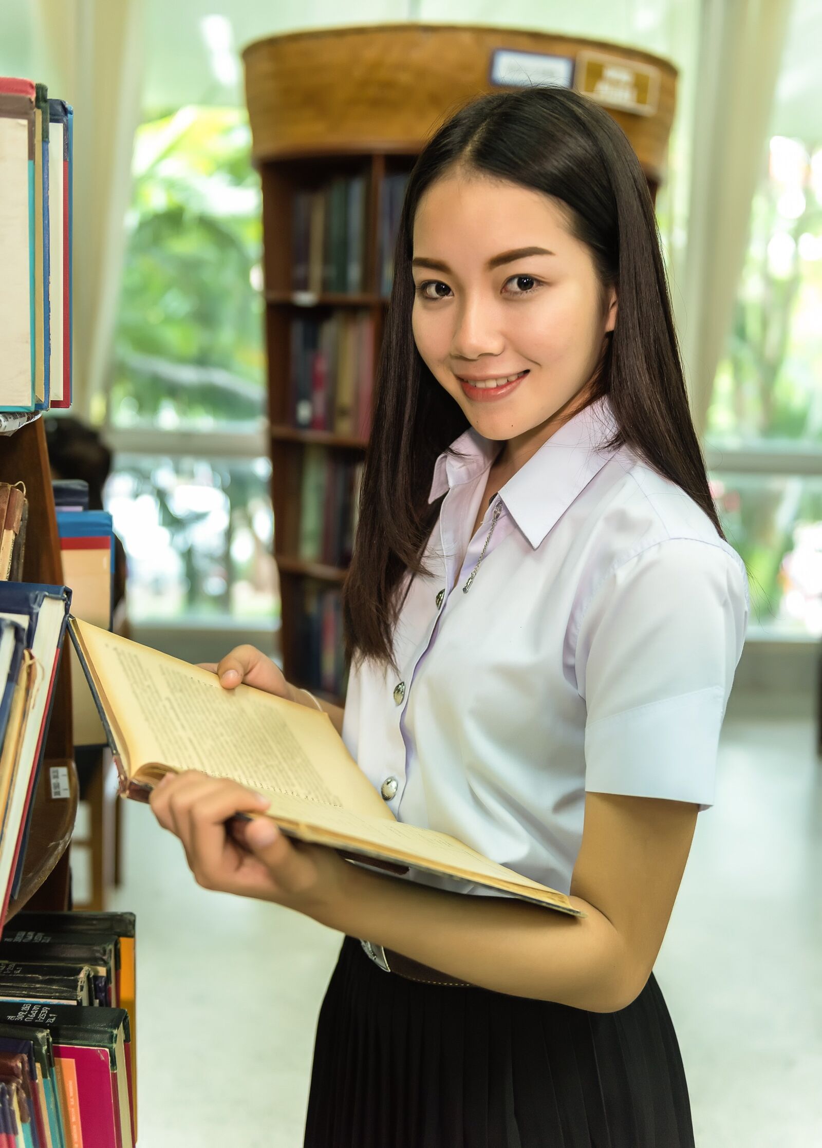 Nikon D810 sample photo. Woman, library, students photography