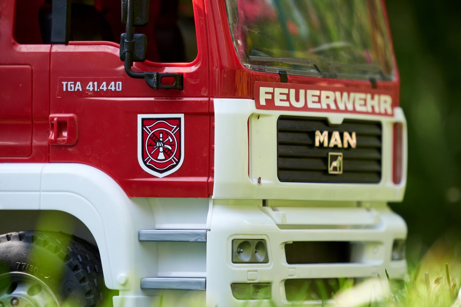 Sony E 55-210mm F4.5-6.3 OSS sample photo. Fire, toys, blue light photography