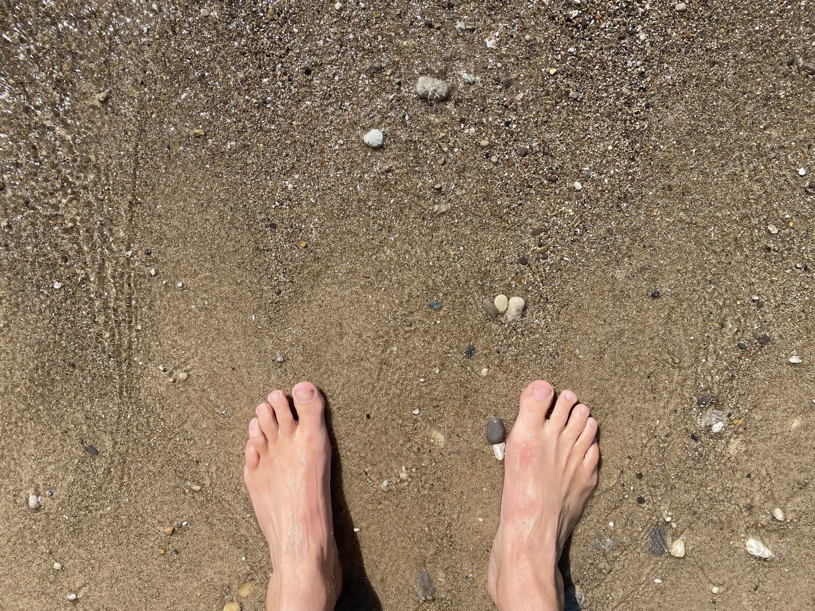 Apple iPhone 11 Pro + iPhone 11 Pro back triple camera 4.25mm f/1.8 sample photo. Barefoot, feet, beach photography