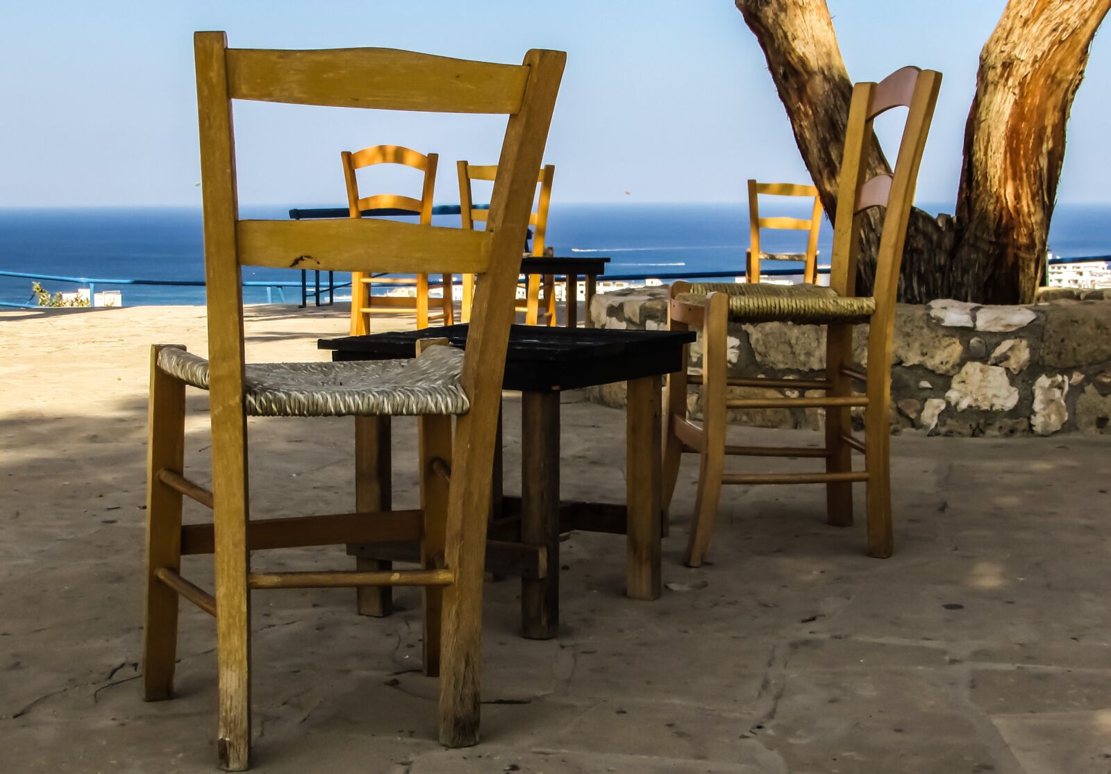 Canon PowerShot SX400 IS sample photo. Square, chairs, view photography