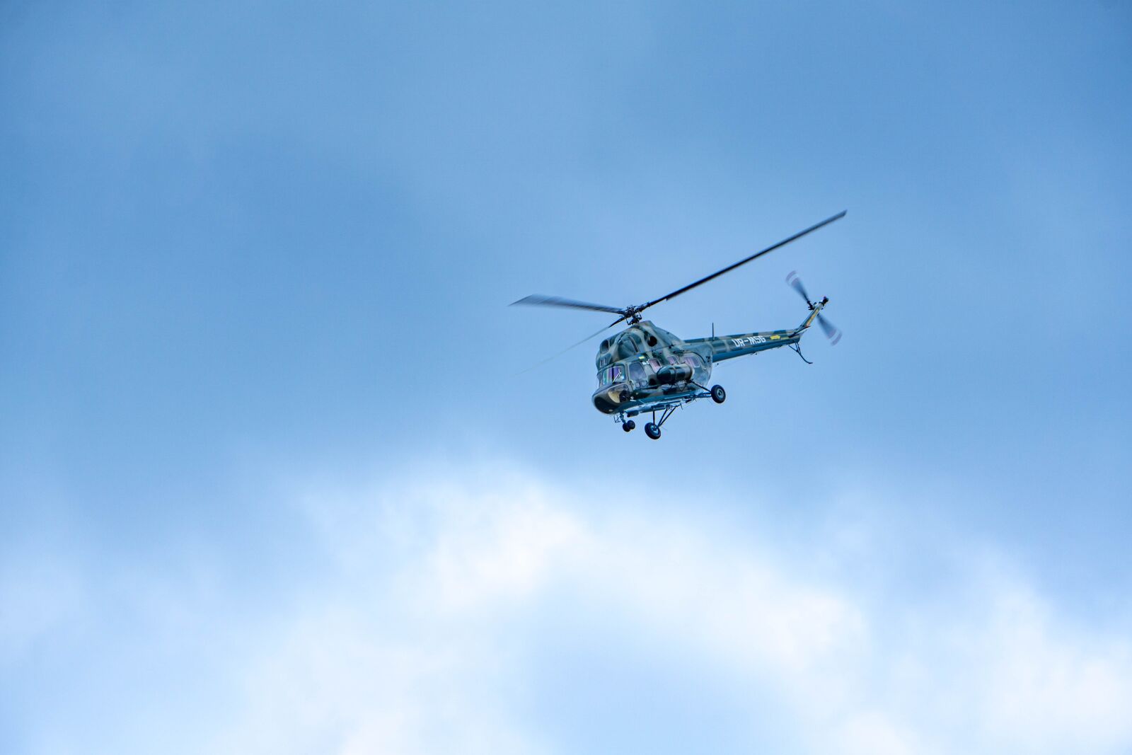 Sony E 55-210mm F4.5-6.3 OSS sample photo. Helicopter, sky, aviaterminal photography