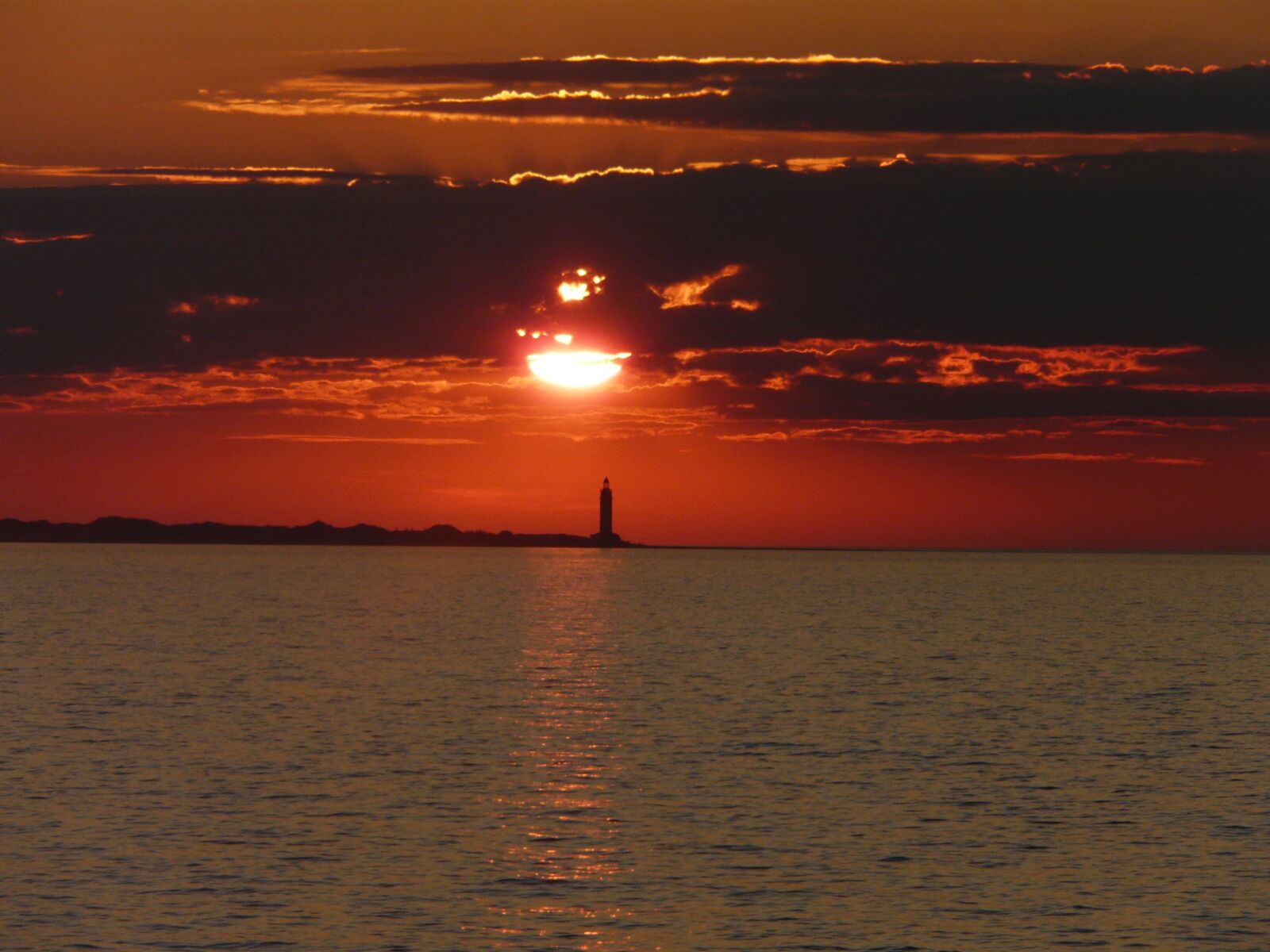 Panasonic DMC-FZ18 sample photo. Sunset, lighthouse, sea photography
