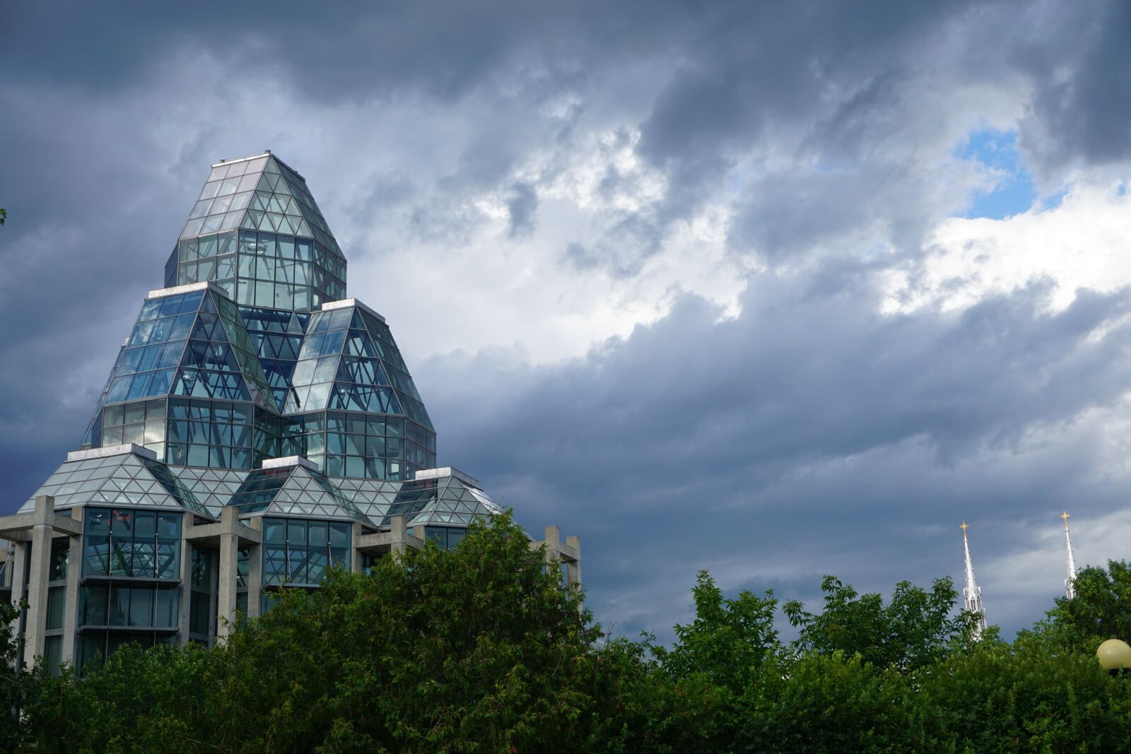 Sony a6000 sample photo. Clouds, glass, building photography