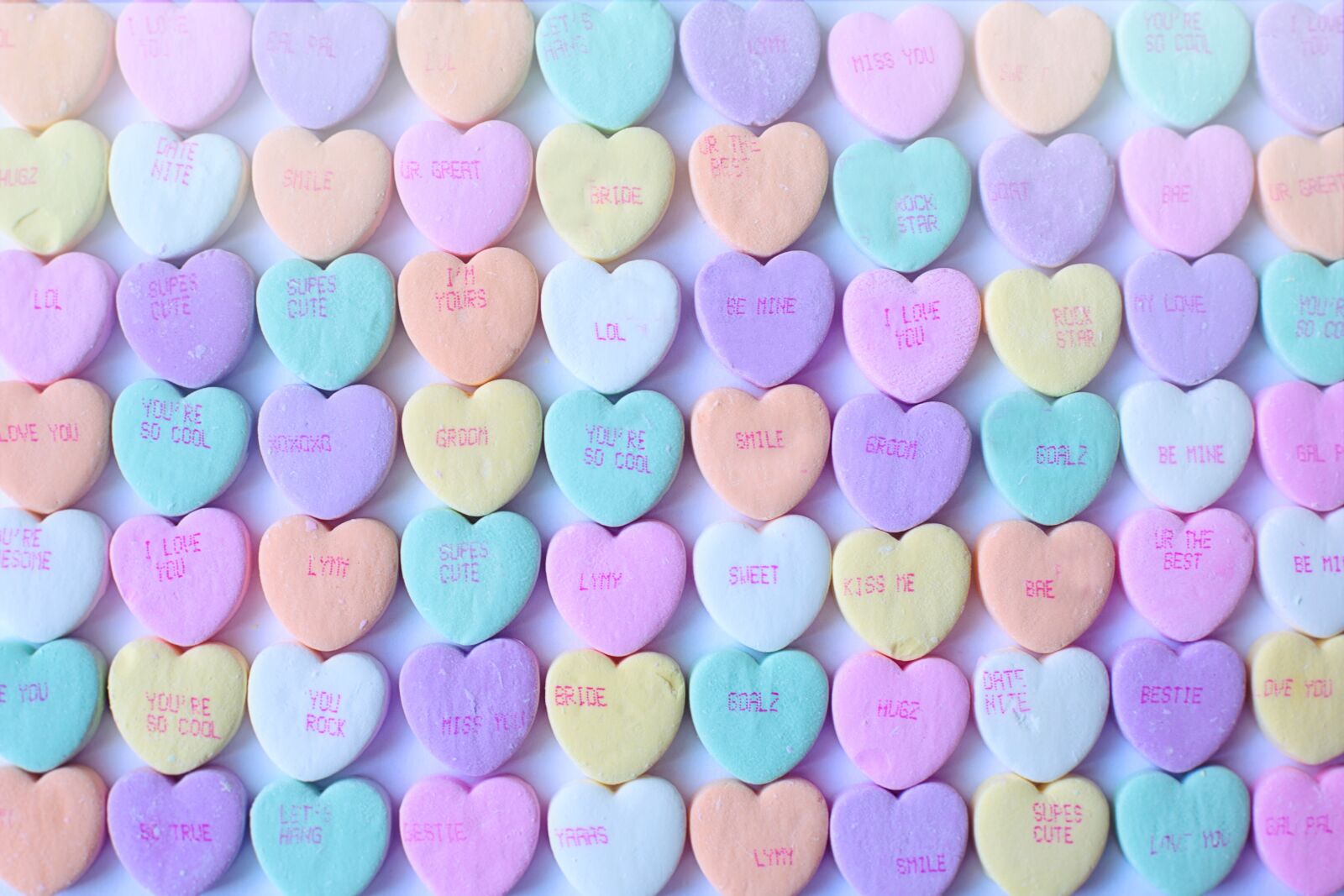 Canon EF 50mm F1.4 USM sample photo. Conversation hearts, background, valentine's photography