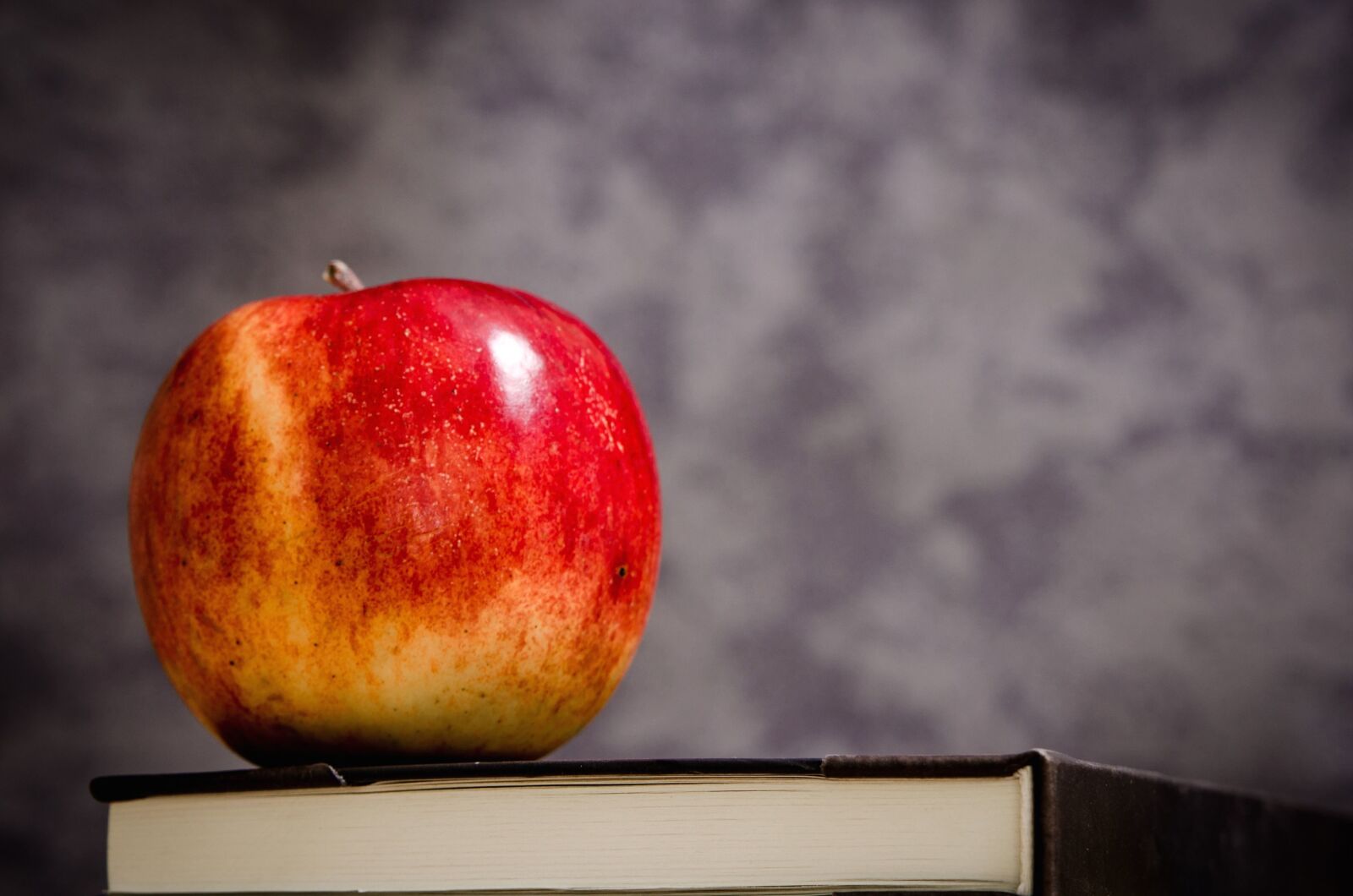 Nikon D5100 sample photo. Apple, fruit, food, book photography