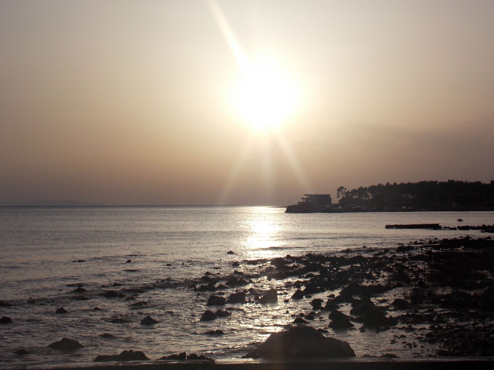 Nikon Coolpix L810 sample photo. Sunset, sea, rocks photography