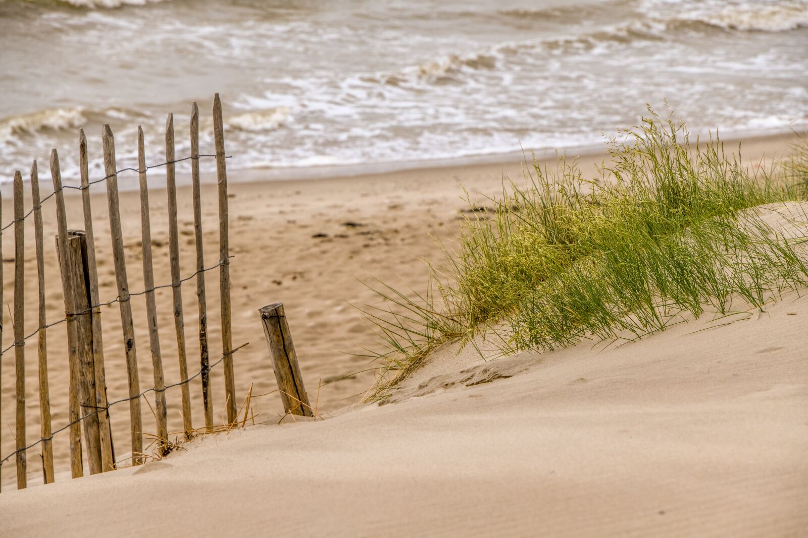 Tamron 28-300mm F3.5-6.3 Di VC PZD sample photo. Beach, fence, sand photography