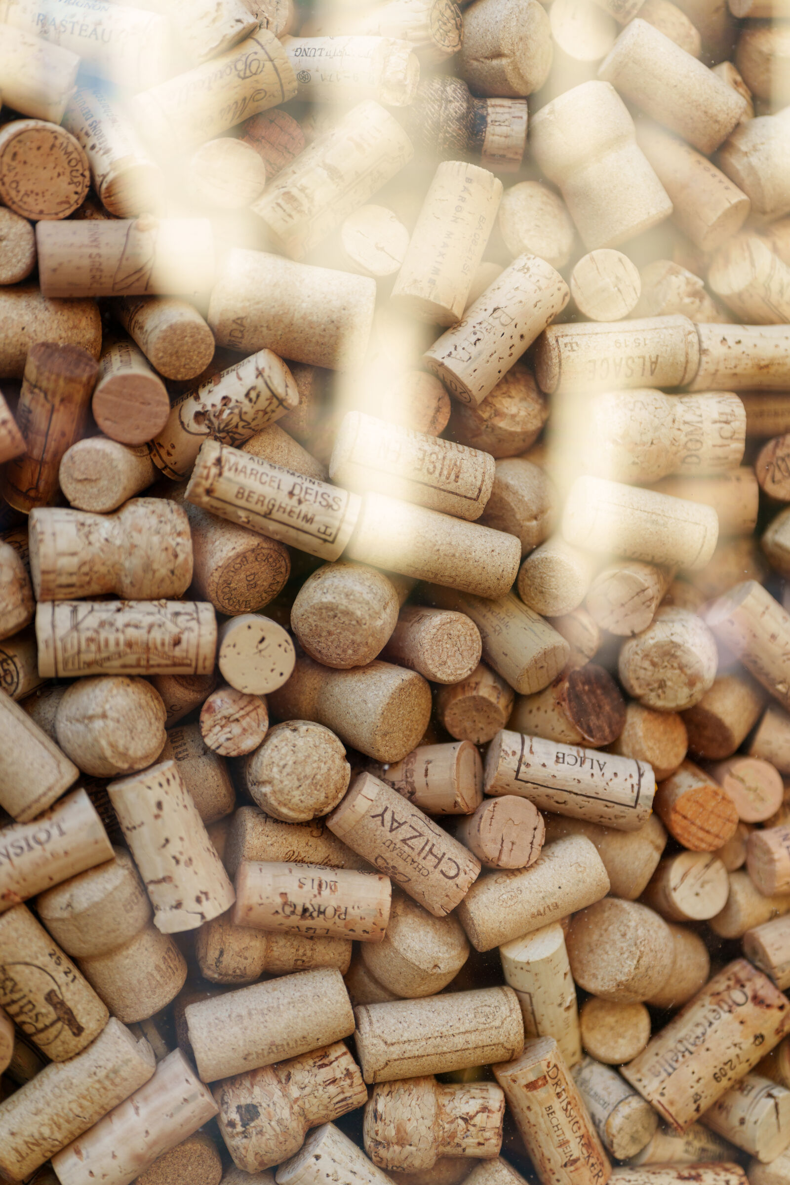 Sony a7R V sample photo. Wine bottle caps photography