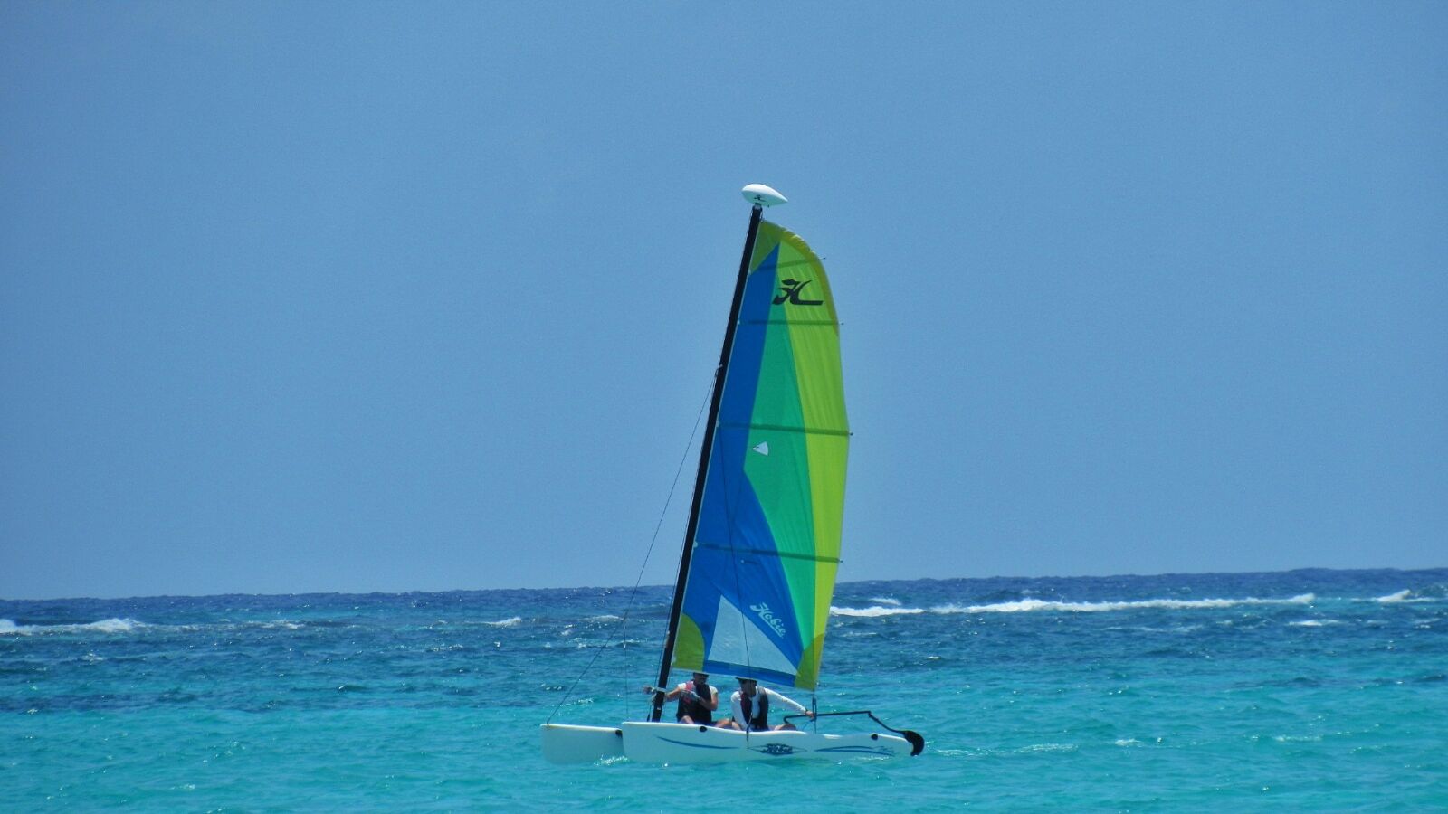 Canon PowerShot SX530 HS sample photo. Sailboat, ocean, reef photography