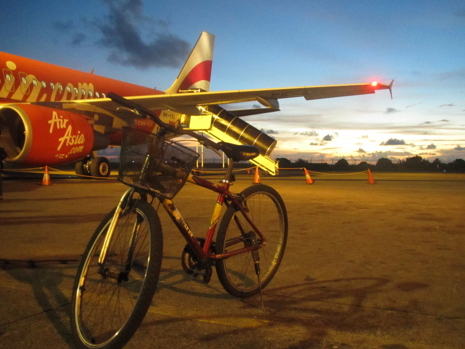 Canon PowerShot SD4500 IS (IXUS 1000 HS / IXY 50S) sample photo. Aeroplane, airfield, airport, bicycle photography