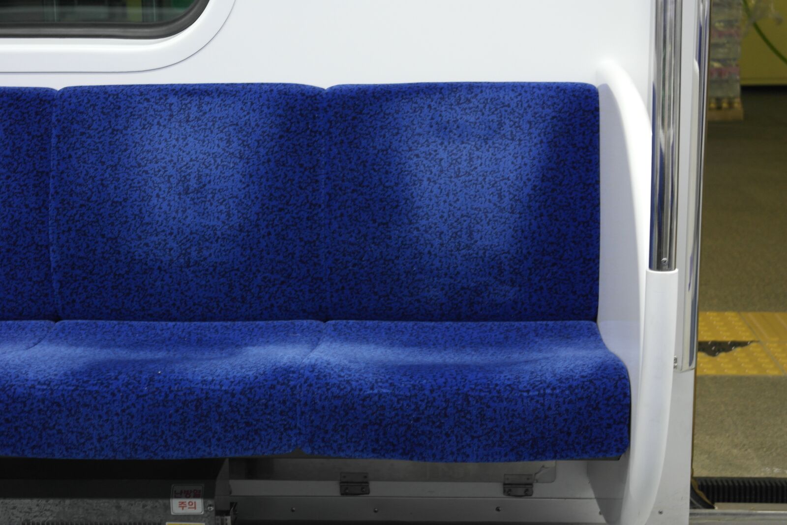 Samsung NX1000 sample photo. Subway, chair, blue photography