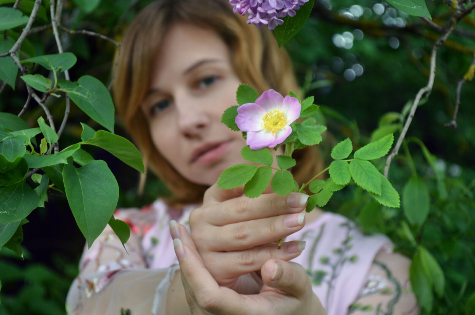 Nikon D3200 sample photo. Flower, hands, stretching photography