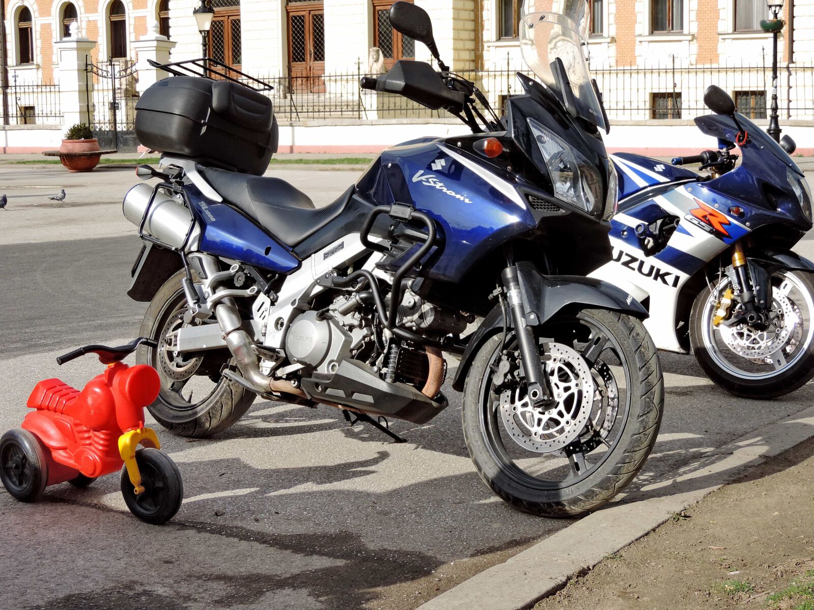 Nikon Coolpix P520 sample photo. Motorcycle, parking lot, street photography