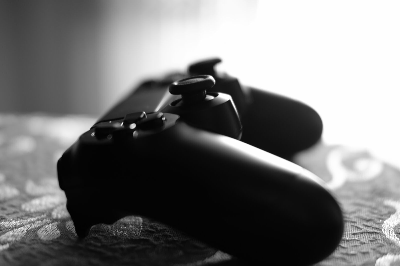 Fujifilm X-T10 + Fujifilm XF 35mm F2 R WR sample photo. Games, joystick, monochrome, playstation, 4 photography