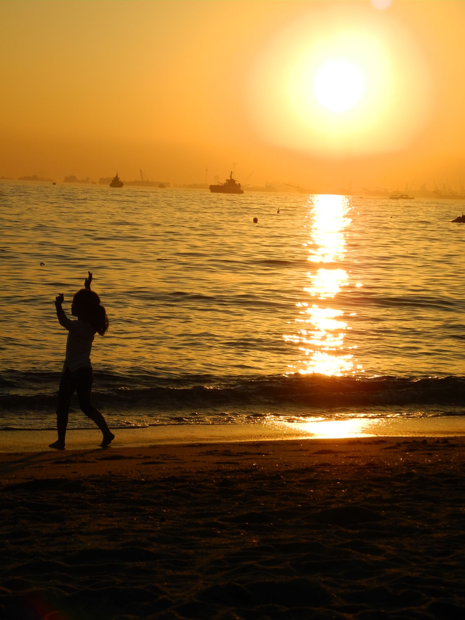 Nikon Coolpix P7100 sample photo. Beach, girl, shadow, sunset photography