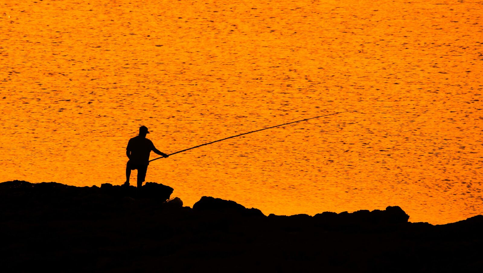 Canon PowerShot SX400 IS sample photo. Fisherman, sea, evening photography