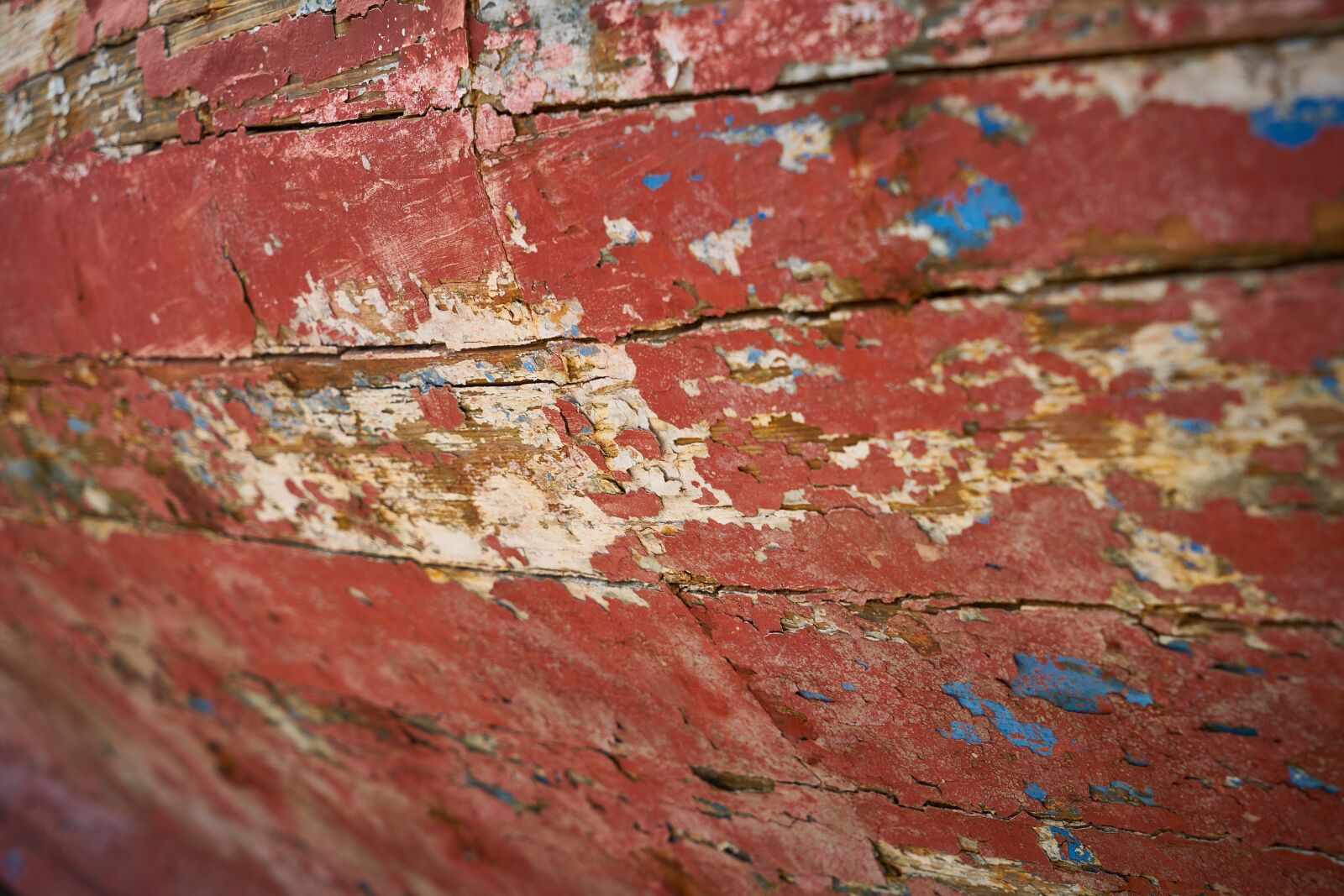 Sony a7R II sample photo. Red, painted, worn photography