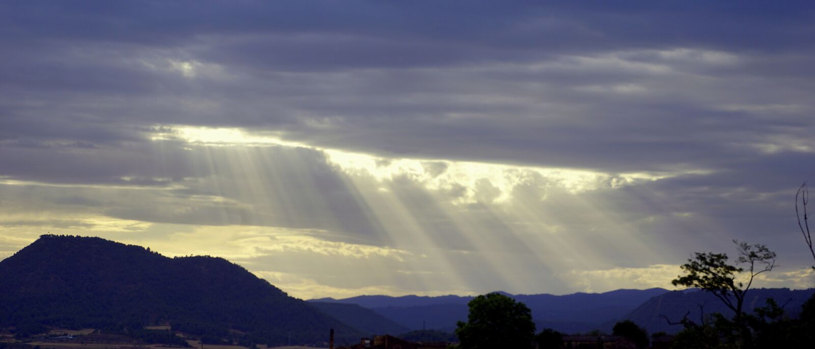 Sony a6000 sample photo. Sunbeams, sky, clouds photography