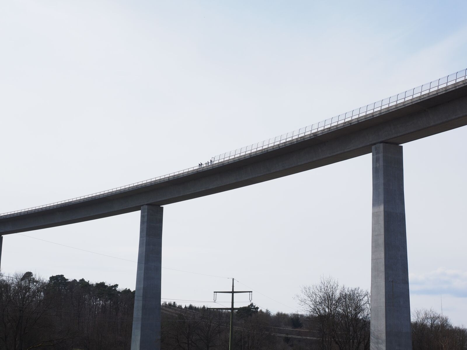 Olympus OM-D E-M1 + Olympus M.Zuiko Digital ED 12-40mm F2.8 Pro sample photo. Bridge, high, building photography
