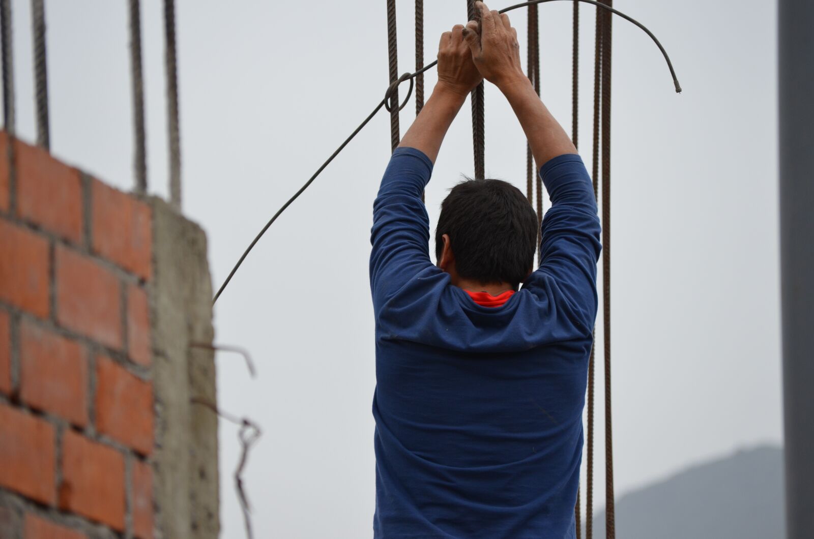 Nikon D5100 sample photo. Worker, work, construction photography