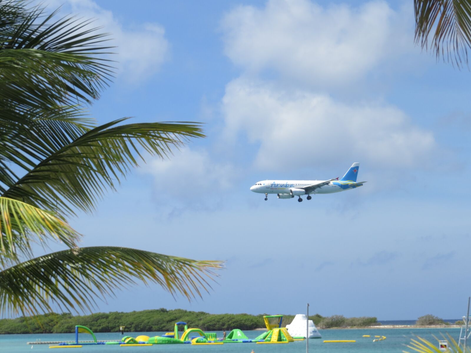 Canon PowerShot SX50 HS sample photo. Plane, beach, sea photography