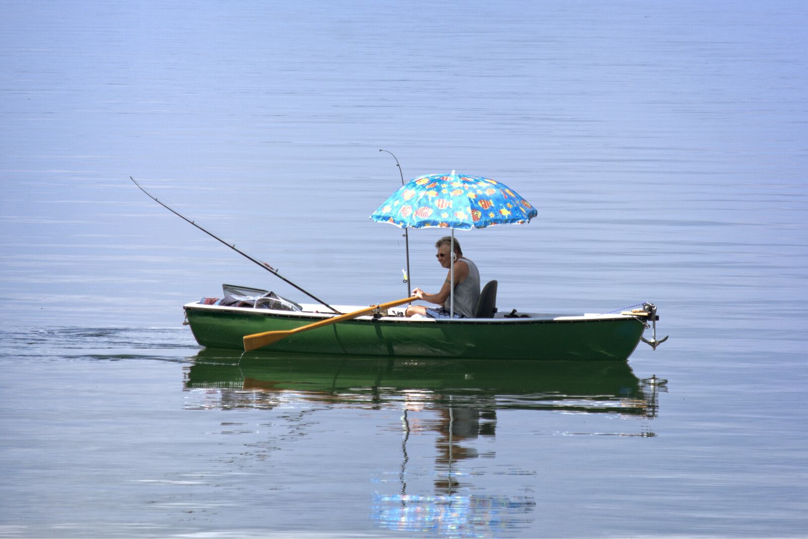 55.0-200.0mm f/4.0-f/5.6 sample photo. Rowing boat, boat, person photography