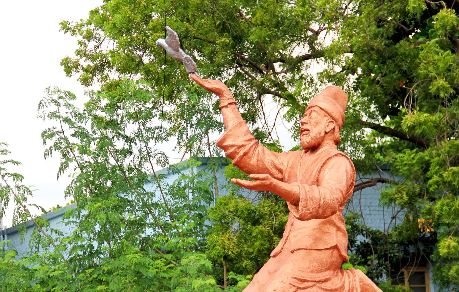 Canon EF-S 18-135mm F3.5-5.6 IS sample photo. Muslim, singer, saint photography