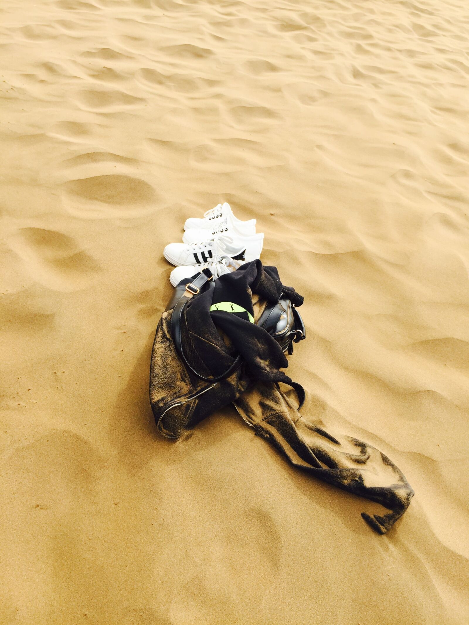 iPhone 6 back camera 4.15mm f/2.2 sample photo. Desert, shoe, backpack photography
