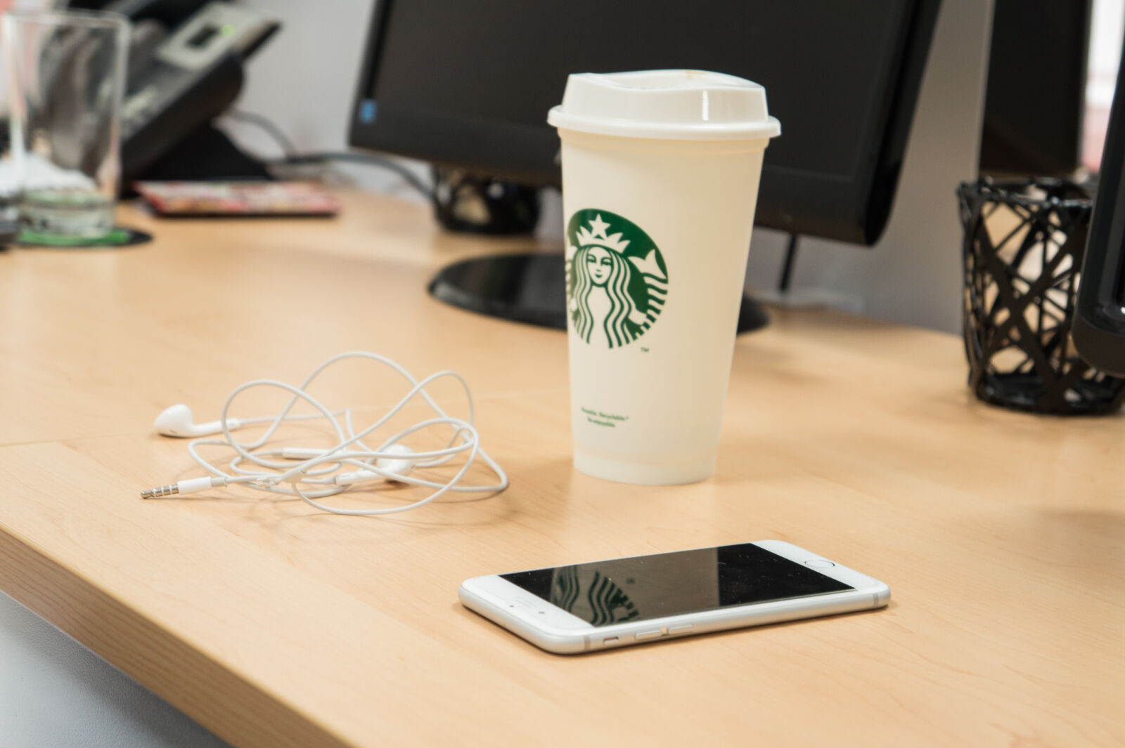 Sony Alpha a3000 sample photo. Coffee, cup, desk, earbuds photography