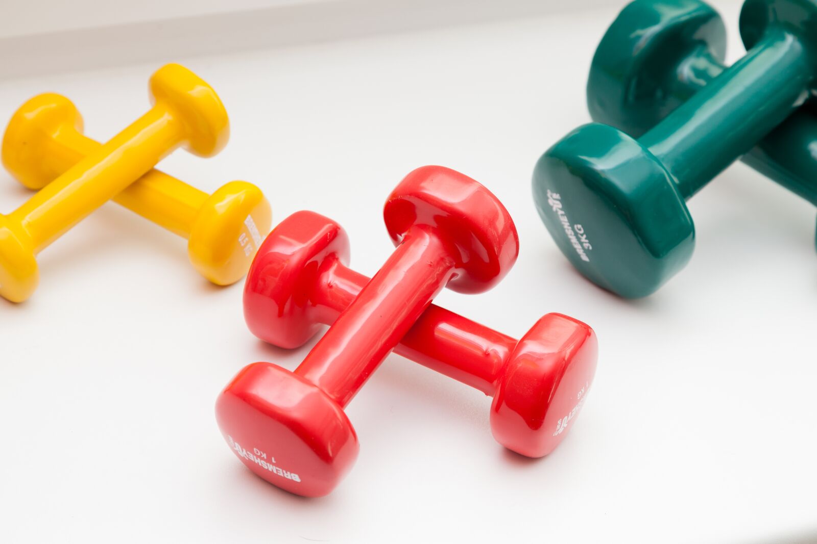 Canon EOS 5D Mark II sample photo. Dumbbells, color, red photography