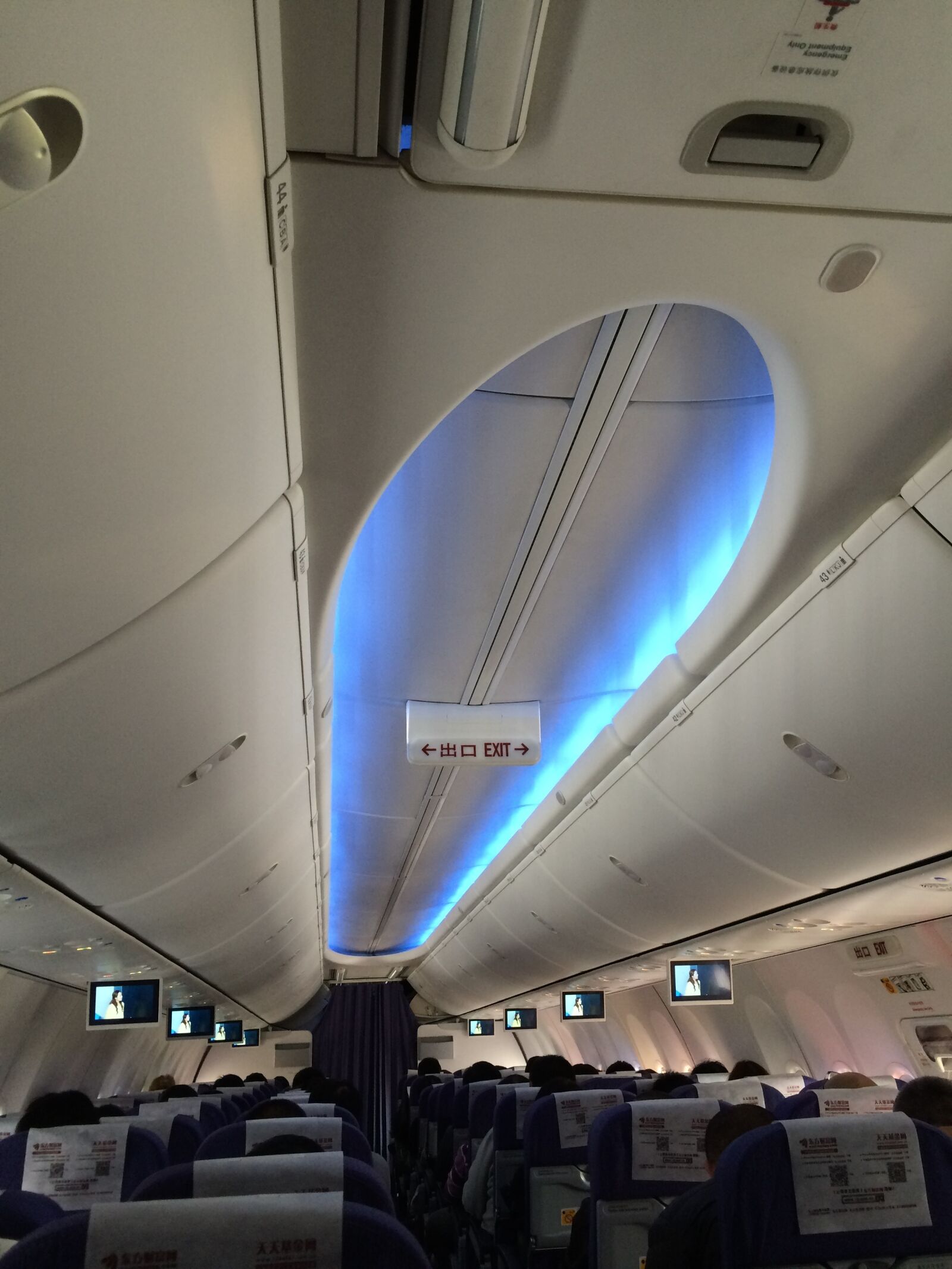 iPhone 5s back camera 4.15mm f/2.2 sample photo. Boeing 737, aircraft interior, airline photography