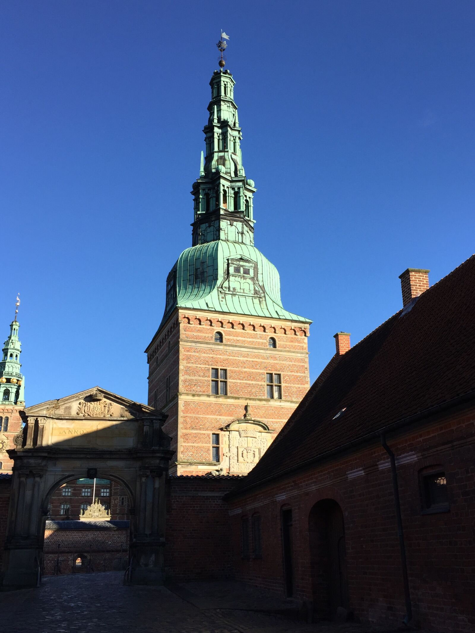 iPhone 6 back camera 4.15mm f/2.2 sample photo. Tower, light, blue photography