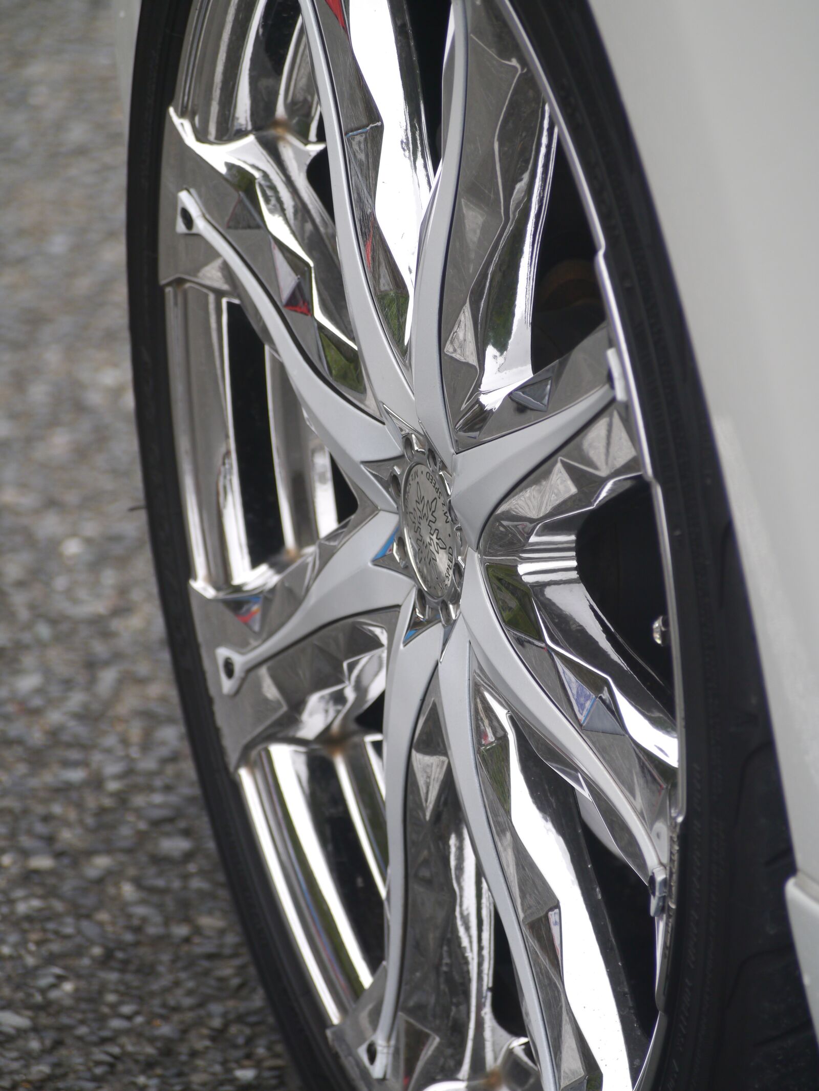 Panasonic Lumix DMC-GX1 sample photo. Car, wheel, radial photography