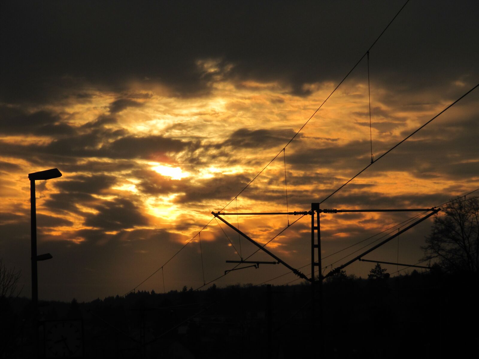 Canon PowerShot SX200 IS sample photo. Sunset, power poles, dusk photography