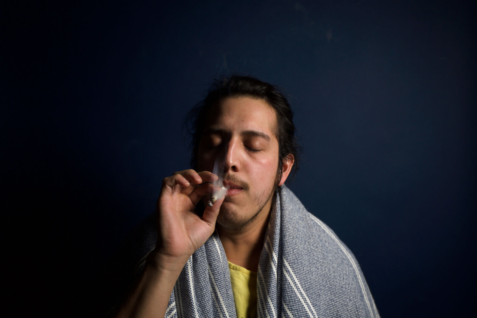 Canon EF 24-70mm F4L IS USM sample photo. Man, smoking, a, cigarette photography