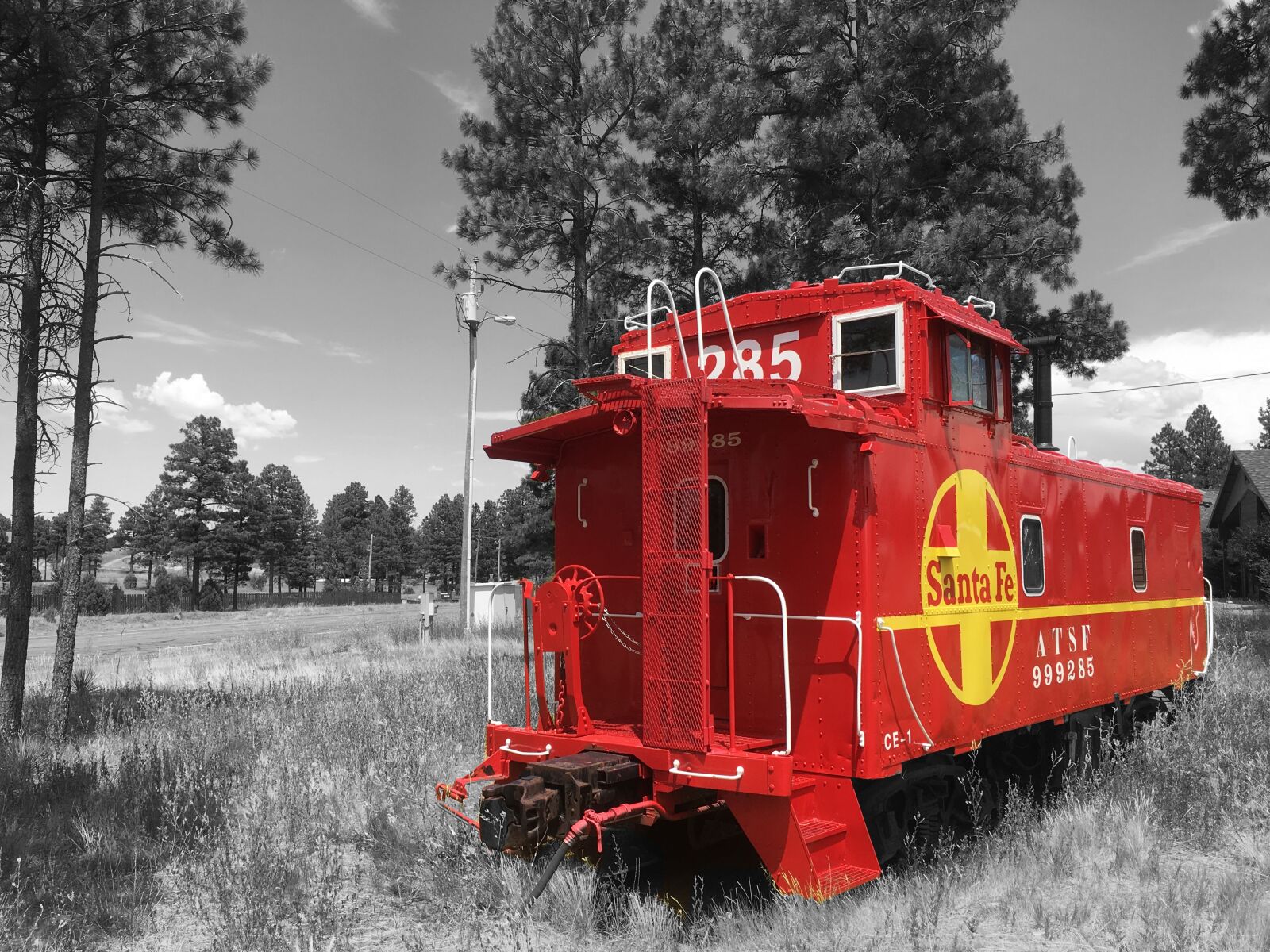 iPhone SE back camera 4.15mm f/2.2 sample photo. Color splash, red, caboose photography
