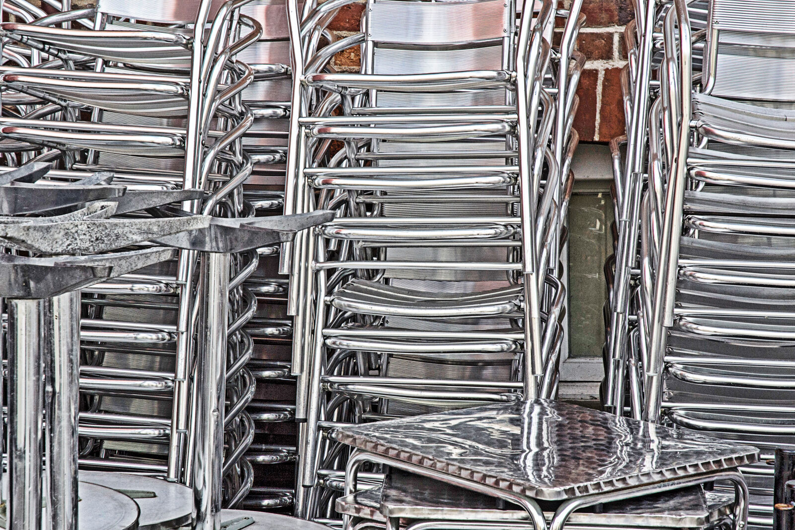 Nikon AF-S DX Nikkor 18-70mm F3.5-4.5G ED-IF sample photo. Chairs, metal, seating, stack photography