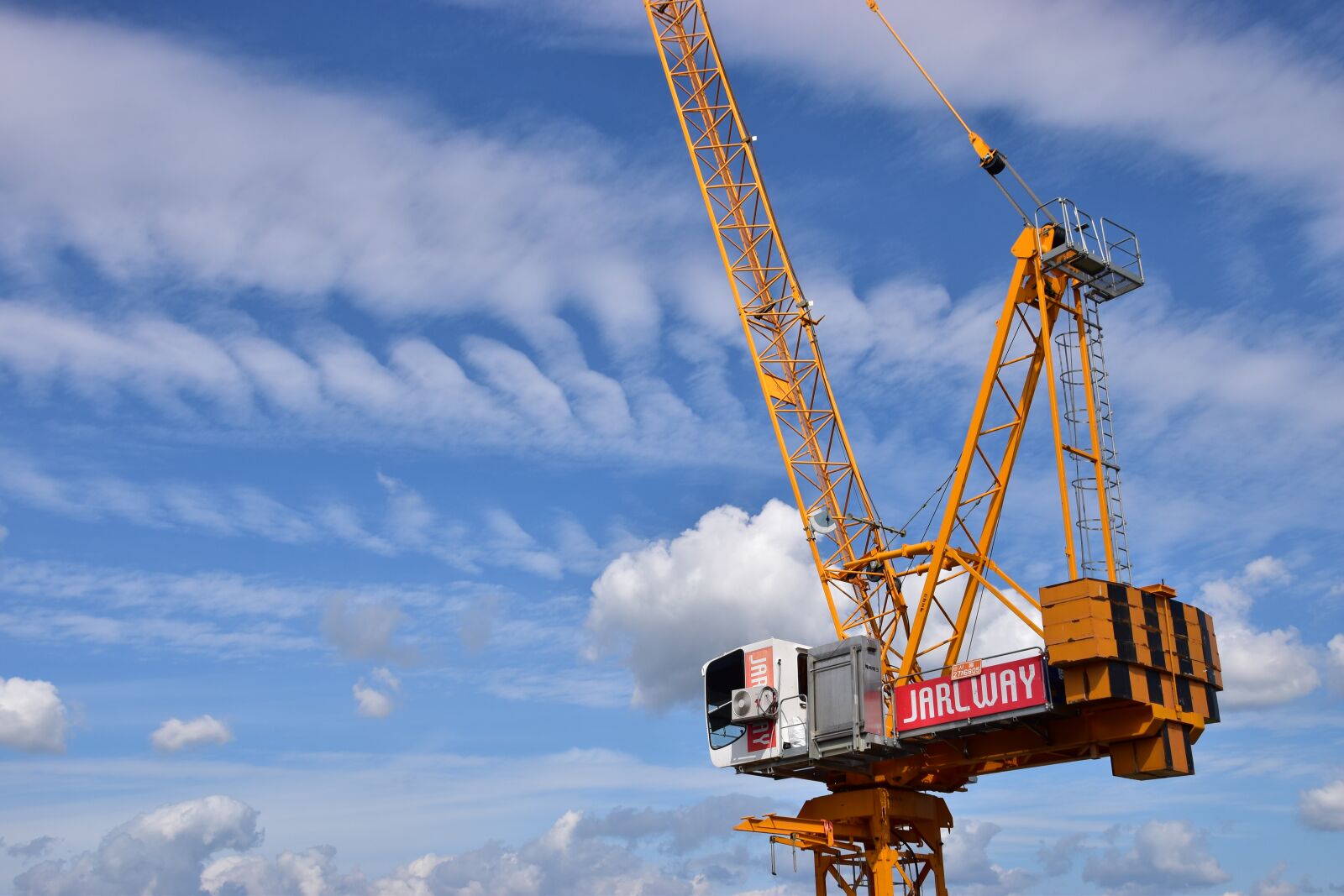 Nikon D5500 sample photo. Sky, tower cranes, corporation photography