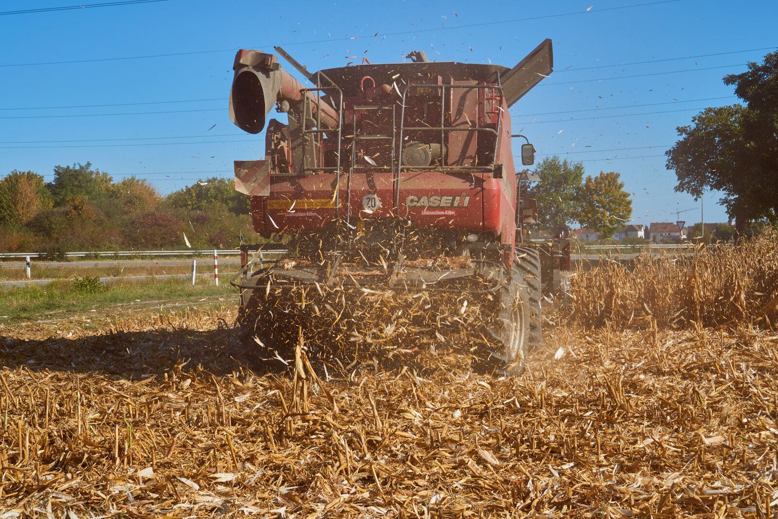 Sony E 35mm F1.8 OSS sample photo. Corn, harvest, combine harvester photography
