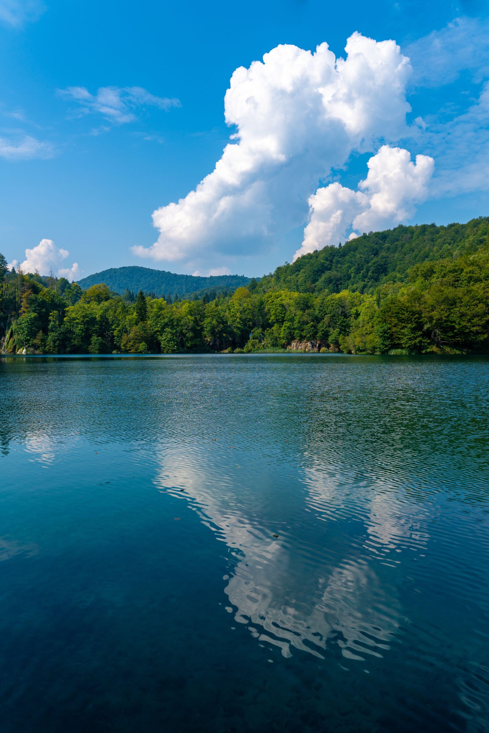 Tamron 28-75mm F2.8 Di III RXD sample photo. Clouds, water, mirroring photography